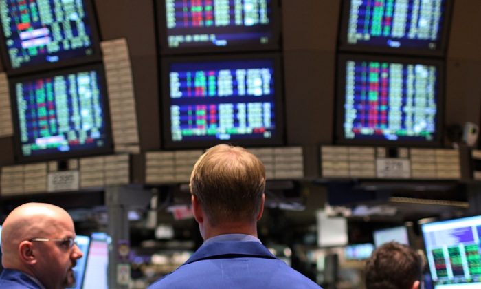 Traders work on the floor of the New York Stock Exchange moments before the closing bell. (Spencer Platt/Getty Images)