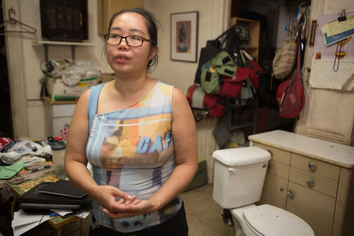 Betty Eng, a radio engineer, is left to live in drastic conditions after she rejected her landlord's buyout offers for her rent-stabilized apartment. (Benjamin Chasteen/Epoch Times)