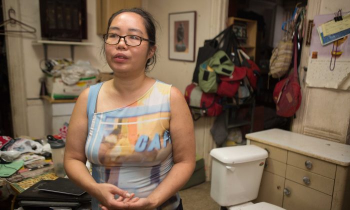 Betty Eng, a radio engineer, is left to live in drastic conditions after she rejected her landlord's buyout offers for her rent-stabilized apartment. (Benjamin Chasteen/Epoch Times)