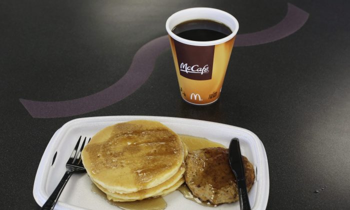 A McDonald's breakfast is arranged for an illustration at a McDonald's restaurant in New York, Feb. 14, 2013. The fast-food chain has no plans to launch all-day breakfast in Canada, despite that its American restaurants will introduce the option on Oct. 6. (The Canadian Press/AP/Mark Lennihan)