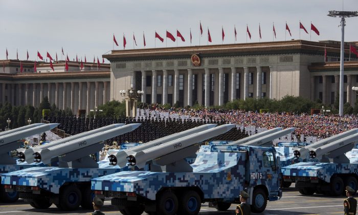 Chinese missiles are paraded on trucks near Tiananmen Square during a military parade in Beijing on Sept. 3, 2015. (Kevin Frayer/Getty Images)