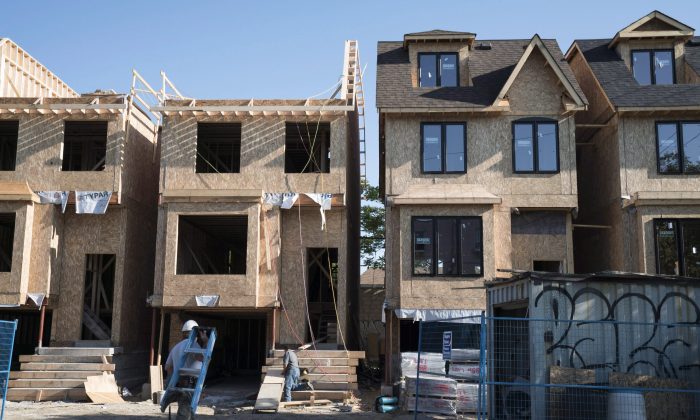 Houses under construction in Toronto on June 26, 2015. Toronto and Vancouver have the two least affordable housing markets in Canada. (The Canadian Press/Graeme Roy)