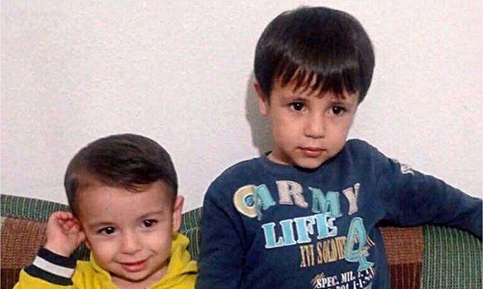 This handout photo courtesy of Tima Kurdi shows Alan Kurdi, left, and his brother Galib Kurdi. The body of 3-year-old Syrian Alan Kurdi was found on a Turkish beach after the small rubber boat he, his 5-year old brother Galib and their mother, Rehan, were in capsized during a desperate voyage from Turkey to Greece. (Tima Kurdi /The Canadian Press via AP)
