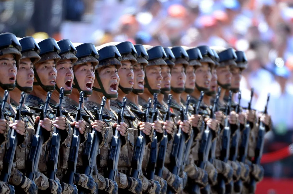 Chinese soldiers march in formation during a military parade in Tiananmen Square in Beijing on September 3. (Wang Zhao/AFP/Getty Images)
