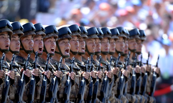 Chinese soldiers march in formation during a military parade in Tiananmen Square in Beijing on September 3. (Wang Zhao/AFP/Getty Images)