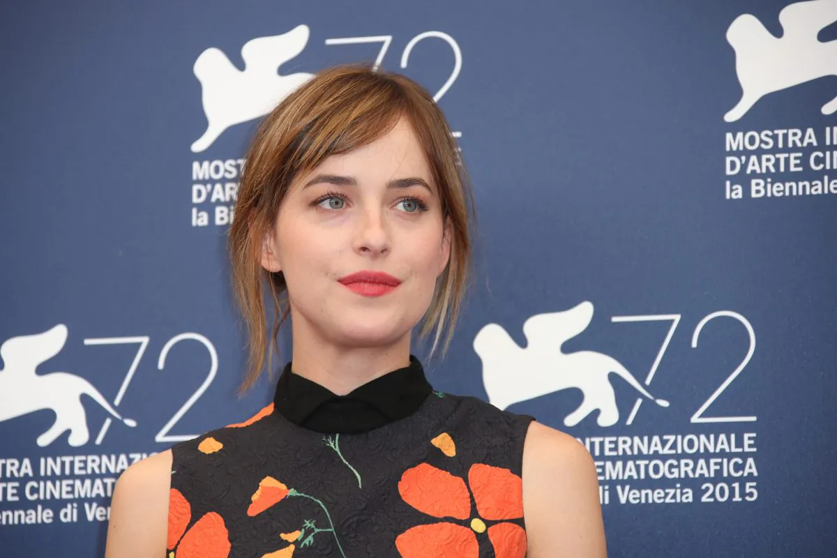 Dakota Johnson poses for photographers at the photo call for the film A Bigger Splash during the 72nd edition of the Venice Film Festival in Venice, Italy, Sunday, Sept. 6, 2015. (Photo by Joel Ryan/Invision/AP)