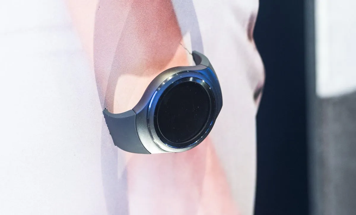 A Samsung Gear S2 watch is fitted onto a cardboard cutout at the booth of South Korean electronics giant Samsung ahead of the opening of the 55th IFA (Internationale Funkausstellung) electronics trade fair in Berlin on September 3, 2015. (John MacDouglall /AFP/Getty Images)