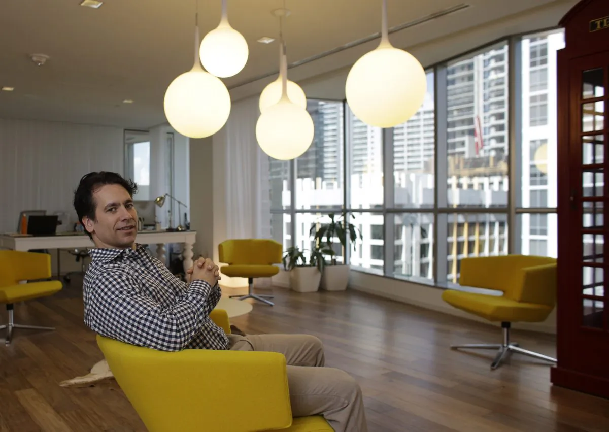 Philippe Houdard, co-founder of Pipeline, a shared workspace company, poses for a photograph in the lobby of Pipeline, in downtown Miami on Aug. 11. (AP Photo/Lynne Sladky)
