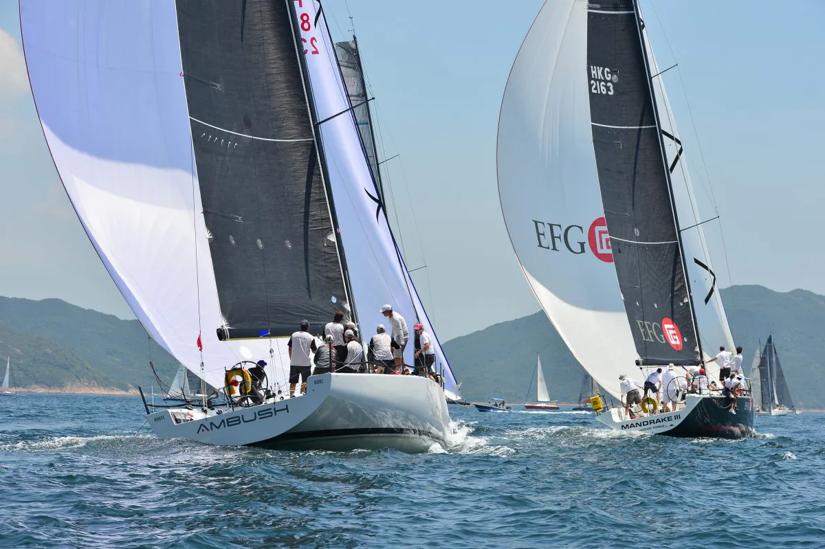 ‘Ambush’ follows ‘EFG Mandrake’ heading for the islands in Race-3 of the HHYC Sails East Port Shelter Regatta on Sunday Sept 6, 2015. (Bill Cox/Epoch Times)