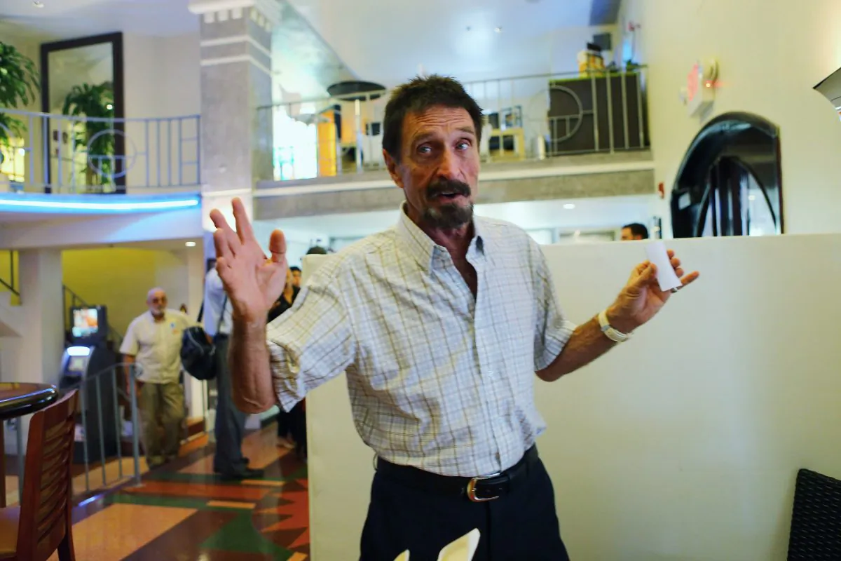 John McAfee talks to the media at the Beacon Hotel where he is staying after arriving last night from Guatemala on December 13, 2012 in Miami Beach, Florida. (Photo by Joe Raedle/Getty Images)