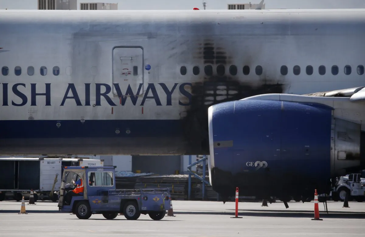 A damaged British Airways Boeing 777-200 sits at McCarran International Airport Wednesday, Sept. 9, 2015, in Las Vegas. (AP Photo/John Locher)