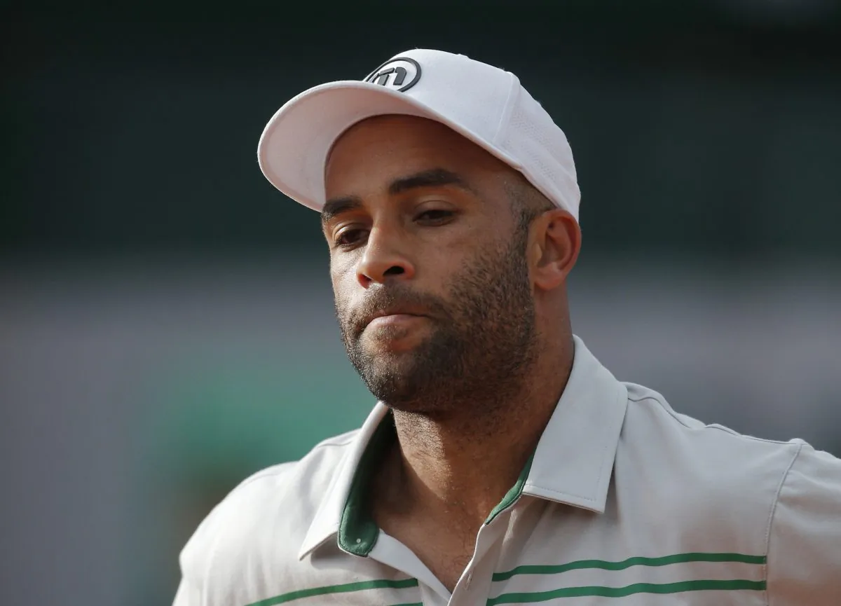 In this May 26, 2013, file photo, James Blake grimaces after missing a return against Serbia's Viktor Troicki at the French Open tennis tournament in Paris. (AP Photo/Michel Spingler)