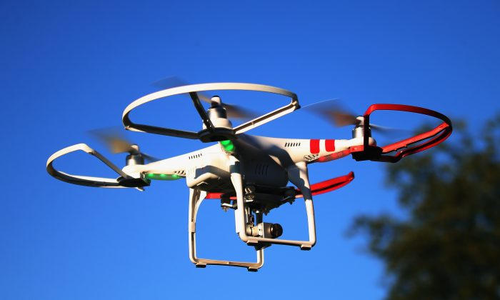 A drone is flown for recreational purposes in the sky above Old Bethpage, New York, on Sept. 5, 2015. (Bruce Bennett/Getty Images)