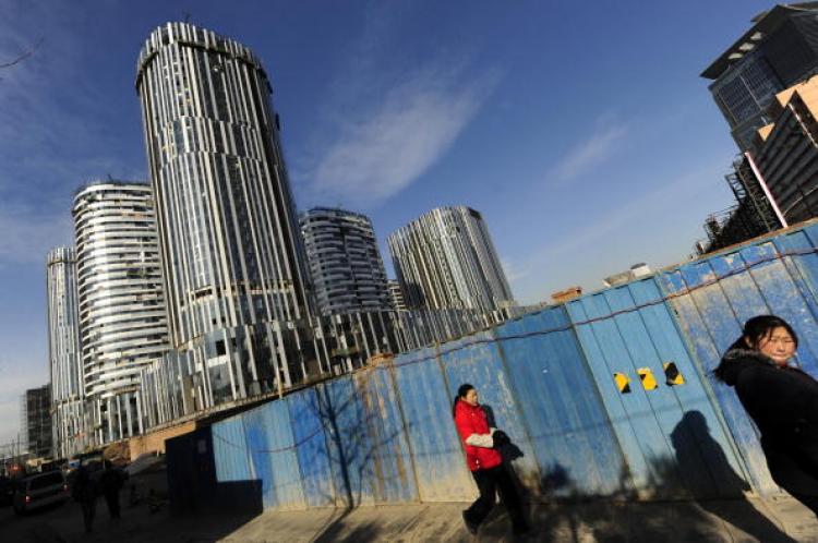 Despite the high vacancy rate, housing prices in Beijing have gone up 200 to 300 percent in the past year. The photo shows a construction site in Beijing on Dec. 16, 2009. (Getty Images) Despite the high vacancy rate, housing prices in Beijing have gone up 200 to 300 percent in the past year. The photo shows a construction site in Beijing on Dec. 16, 2009. (Getty Images)