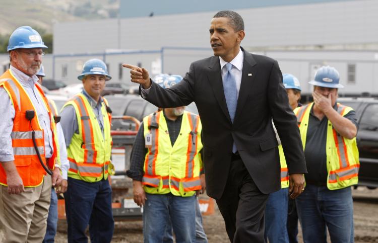 GREEN JOBS: President Barack Obama heads inside to deliver a speech after meeting with construction workers building a new Solyndra solar panel factory May 26, 2010 in Fremont, California. President Obama toured Solyndra Inc., a growing solar power equipment facility that is adding jobs as they expand their operation. (Photo by Paul Chinn-Pool/Getty Images) GREEN JOBS: President Barack Obama heads inside to deliver a speech after meeting with construction workers building a new Solyndra solar panel factory May 26, 2010 in Fremont, California. President Obama toured Solyndra Inc., a growing solar power equipment facility that is adding jobs as they expand their operation. (Photo by Paul Chinn-Pool/Getty Images)