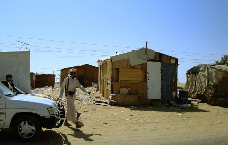 A Yemeni walks near wooden huts in the province of Marib, 118 miles east of Sana'a, June 9. The Obama administration will boost humanitarian help for Yemen by $29.6 million, providing the country with $42.5 this year, the White House announced on Thursday. (AFP/Getty Images ) A Yemeni walks near wooden huts in the province of Marib, 118 miles east of Sana'a, June 9. The Obama administration will boost humanitarian help for Yemen by $29.6 million, providing the country with $42.5 this year, the White House announced on Thursday. (AFP/Getty Images )