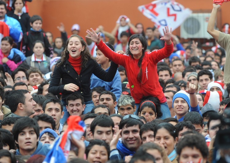 Paraguayan soccer fans celebrate after Paraguay defeated Japan in the FIFA World Cup 2010 round of 16 match, in downtown Asuncion, in 2010. (Norberto DuarteAFP/Getty Images)