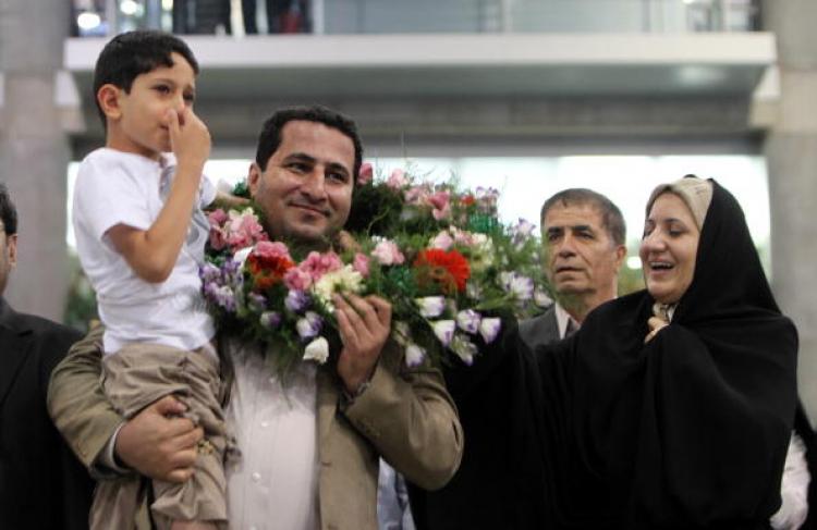 Iranian nuclear scientist Shahram Amiri is welcomed by family members upon his arrival at Imam Khomeini Airport in Tehran on July 15. Amiri claimed he was subjected to Ã�Â¢Ã¯Â¿Â½Ã¯Â¿Â½mental and physical tortureÃ�Â¢Ã¯Â¿Â½Ã¯Â¿Â½ by the CIA. (Atta Kenare/Getty Images)