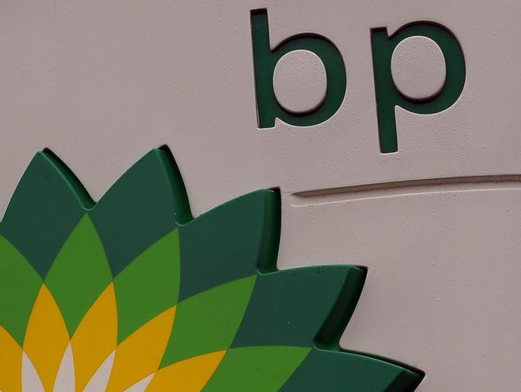 A BP petrol station logo is pictured in Manchester, north-west England. BP's costs for the Deepwater Horizon spill have risen to $6.1 billion according to the company. ANDREW YATES/AFP/Getty Images)  (Andrew Yates/Getty Images)