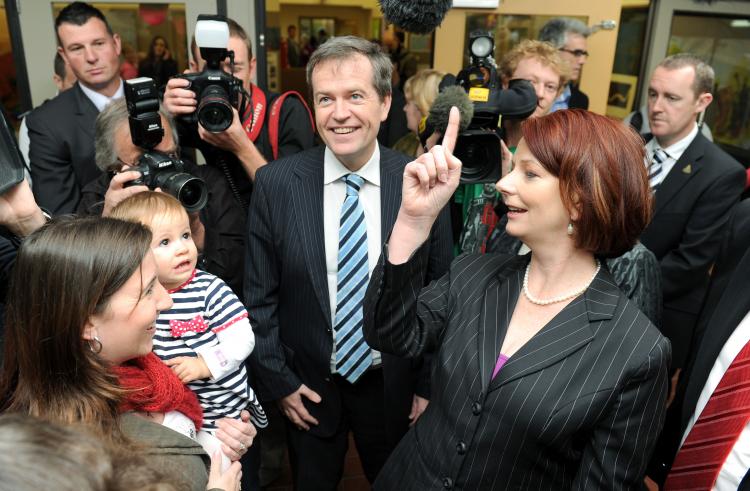 Julia Gillard (R) and Bill Shorten (C) in Melbourne on July 29. Shorten is married to the daughter of Governor-General Quentin Bryce who has the power to choose Australia's next prime minister following the Federal Election stalemate. (WILLIAM WEST/AFP/Getty Images)