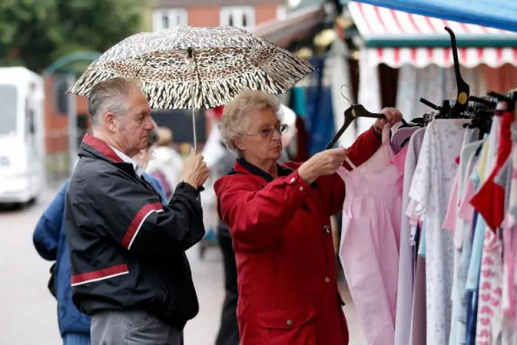 Bargains hunters at Bolton Market on Aug. 17, 2010. (Christopher Furlong/Getty Images)