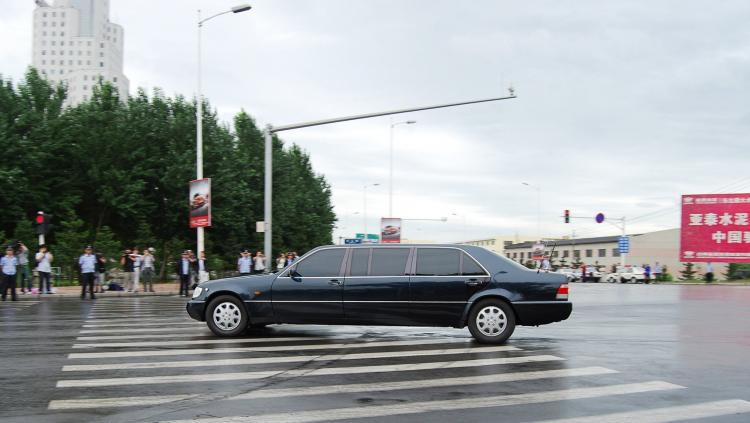 KIM JONG IL: A limousine suspected of carrying North Korean leader Kim Jong Il leaves a hotel in the Chinese city of Jilin on Aug. 27.  (Jiji Press/AFP/Getty Images)