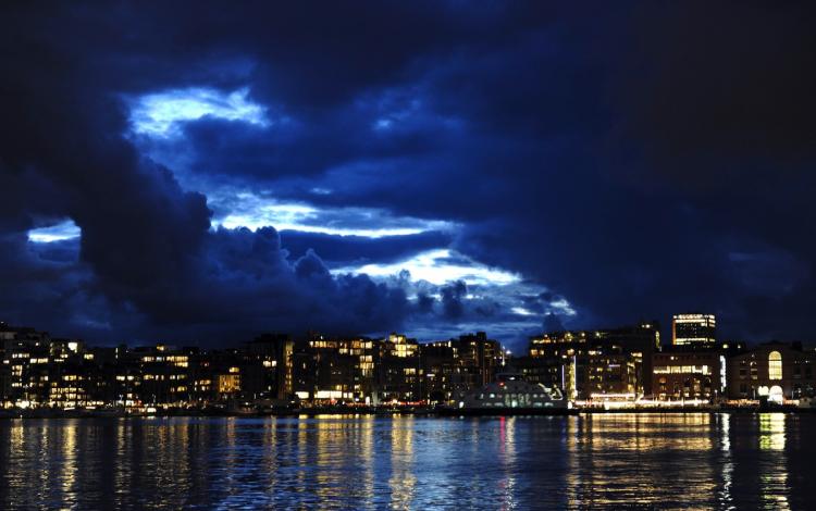 Skyline in Oslo, rated the most expensive city, at the Norwegian capital's waterfront and entertainment area, as a break in the cloud cover lets light in, at dusk. (Odd Andersen/Getty Images ) Skyline in Oslo, rated the most expensive city, at the Norwegian capital's waterfront and entertainment area, as a break in the cloud cover lets light in, at dusk. (Odd Andersen/Getty Images )