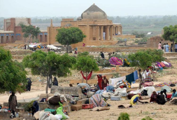 Pakistani flood survivors take shelter in southern Sindh province's Makli on August 31. Flood waters that have devastated Pakistan, covering a fifth of the country and leaving at least 1,600 people dead, are now draining into the Arabian Sea. (Rizwan Tabass/Getty Images ) Pakistani flood survivors take shelter in southern Sindh province's Makli on August 31. Flood waters that have devastated Pakistan, covering a fifth of the country and leaving at least 1,600 people dead, are now draining into the Arabian Sea. (Rizwan Tabass/Getty Images )