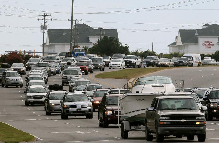 Vehicles sit in traffic on the Croatan Highway as people evacuate the Outer Banks area in Southern Shores, N.C. on Sept. 2. (Mark Wilson/Getty Images) Vehicles sit in traffic on the Croatan Highway as people evacuate the Outer Banks area in Southern Shores, N.C. on Sept. 2. (Mark Wilson/Getty Images)