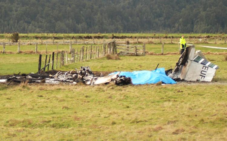 The wreckage of the crashed skydiving plane is seen at the end of the runway at Fox Glacier Airport on September 4, 2010 in Fox Glacier, New Zealand. The plane crashed on take off on Saturday afternoon, resulting in the deaths of all 9 tourists and crew o (Janna Sherman/Hokitika Guardian/Getty Images) The wreckage of the crashed skydiving plane is seen at the end of the runway at Fox Glacier Airport on September 4, 2010 in Fox Glacier, New Zealand. The plane crashed on take off on Saturday afternoon, resulting in the deaths of all 9 tourists and crew o (Janna Sherman/Hokitika Guardian/Getty Images)