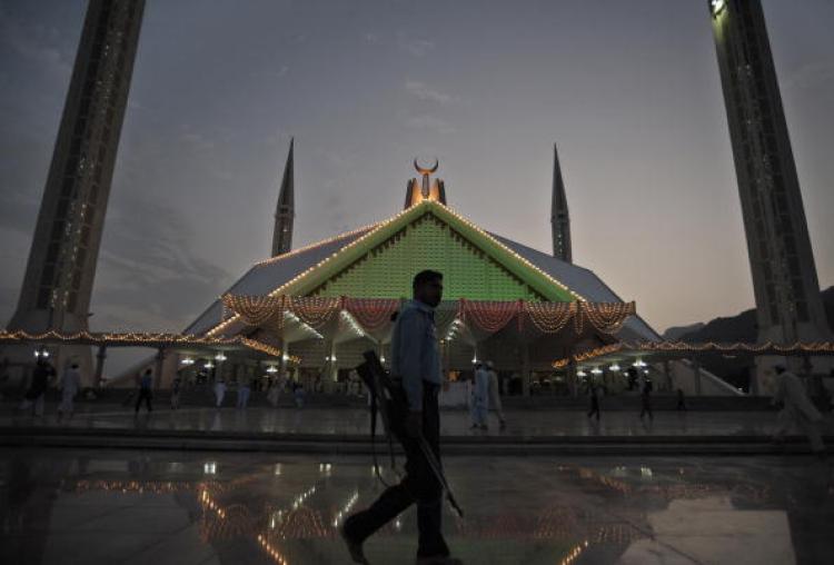 A Pakistani policeman patrols at the Faisal Mosque in Islamabad on September 6. Islamabad Police announced that it will formally charge three men connected to Faisal Shahzad, the would-be Times Square car bomber. (Farooq Naeem/Getty Images) A Pakistani policeman patrols at the Faisal Mosque in Islamabad on September 6. Islamabad Police announced that it will formally charge three men connected to Faisal Shahzad, the would-be Times Square car bomber. (Farooq Naeem/Getty Images)