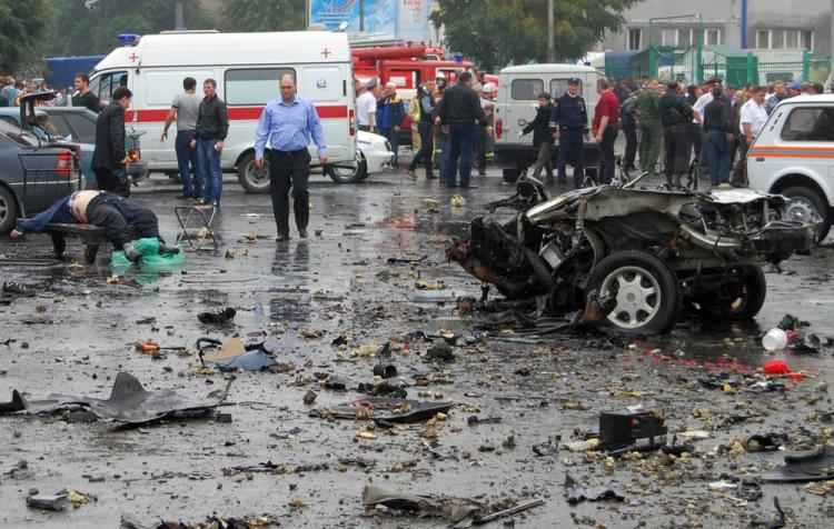 Russian investigators examine the site of a blast near a market in Vladikavkaz on September 9, 2010. (STR/AFP/Getty Images) Russian investigators examine the site of a blast near a market in Vladikavkaz on September 9, 2010. (STR/AFP/Getty Images)