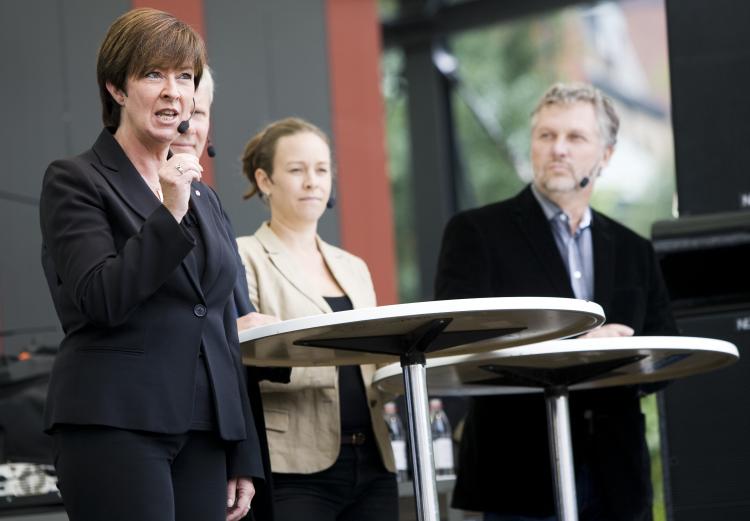 WAR OF WORDS: Speaking at a Stockholm rally on Sept. 12, the leaders of the the Social Democrats led by Mona Sahlin (L), the Left Party led by Lars Ohly (2nd L, behind Sahlin) and the Green Party represented by Maria Wetterstrand (2nd R) and Peter Eriksson (R), try to win undecided voters for their coalition in Sweden's Sept. 19 elections. (Jonathan Nackstrand/Getty Images) WAR OF WORDS: Speaking at a Stockholm rally on Sept. 12, the leaders of the the Social Democrats led by Mona Sahlin (L), the Left Party led by Lars Ohly (2nd L, behind Sahlin) and the Green Party represented by Maria Wetterstrand (2nd R) and Peter Eriksson (R), try to win undecided voters for their coalition in Sweden's Sept. 19 elections. (Jonathan Nackstrand/Getty Images)