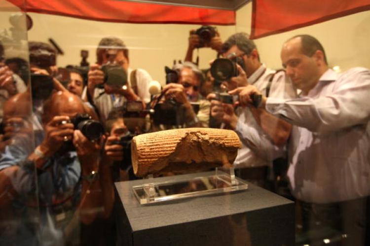 Photographers at the unveiling of the Cyrus Cylinder at the National Museum of Iran in Tehran last year. The artefact dating from the 6th century BC has been returned on loan to Iran by the British Museum in London. (Atta Kenare/AFP/Getty Images) Photographers at the unveiling of the Cyrus Cylinder at the National Museum of Iran in Tehran last year. The artefact dating from the 6th century BC has been returned on loan to Iran by the British Museum in London. (Atta Kenare/AFP/Getty Images)