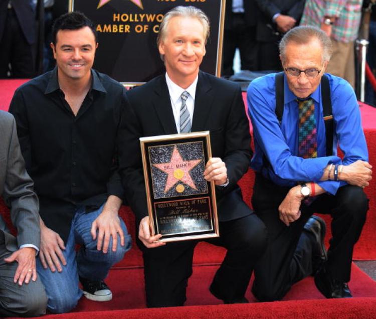 Bill Maher (C) is joined by animator Seth MacFarlane (L) and TV host Larry King (R) as he poses with copy of the star at the ceremony to unveil his Hollywood Walk of Fame star in Hollywood on September 14. (Mark Ralston/Getty Images ) Bill Maher (C) is joined by animator Seth MacFarlane (L) and TV host Larry King (R) as he poses with copy of the star at the ceremony to unveil his Hollywood Walk of Fame star in Hollywood on September 14. (Mark Ralston/Getty Images )