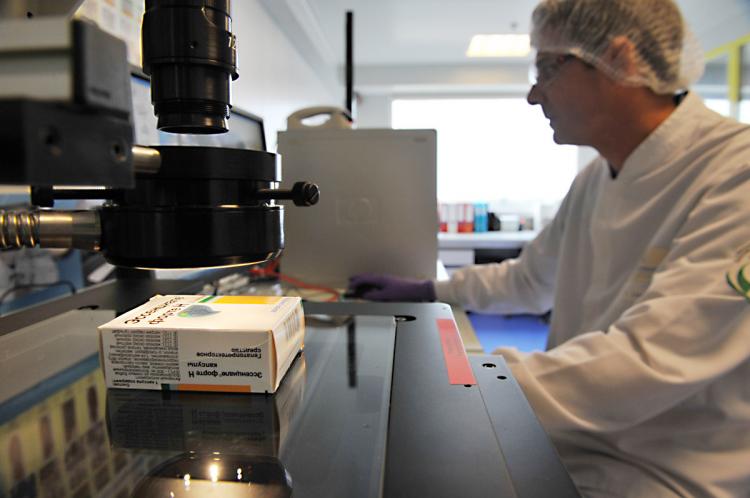 AUTHENTICITY: An electronic microscope is used by a laboratory in Tours, France, to verify the authenticity of products in a bid to fight against smuggled and counterfeit medicines. (Alan Jocard/AFP/Getty Images)