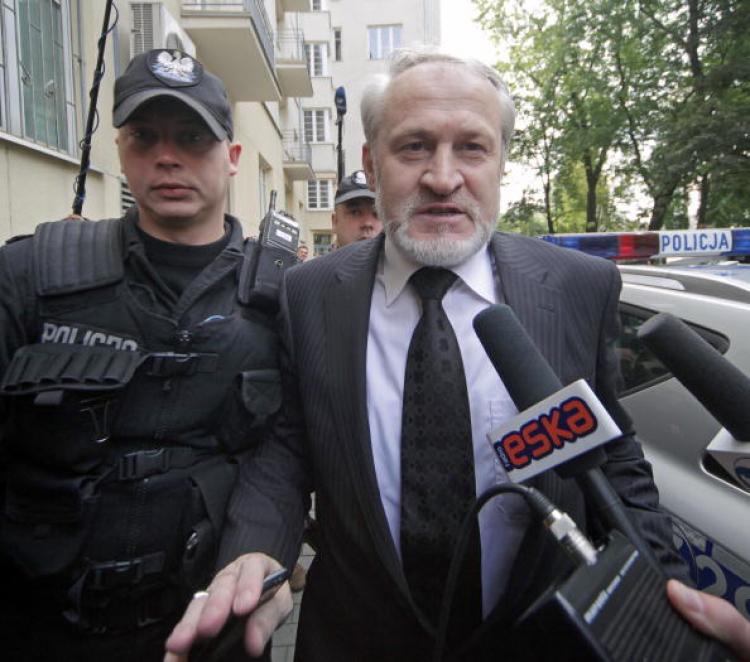 Ahmed Zakayev, the exiled Chechen independence leader Akhmed Zakayev, is escorted by police after on September 17. A Polish court decided to free Zakayev just after a couple days after his arrest. (Darek Redos/Getty Images ) Ahmed Zakayev, the exiled Chechen independence leader Akhmed Zakayev, is escorted by police after on September 17. A Polish court decided to free Zakayev just after a couple days after his arrest. (Darek Redos/Getty Images )
