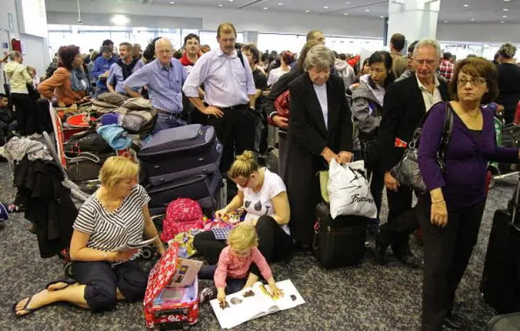 Passengers wait in line to check-in for their Virgin Blue flights at Melbourne Airport on Sept. 27, in Melbourne. (Scott Barbour/Getty Images)