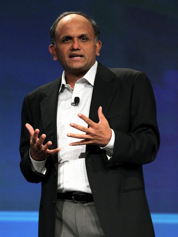ALLIANCE WITH MICROSOFT? Adobe Systems CEO Shantanu Narayen speaks during a keynote address at the BlackberryDevCon 2010 on Sep. 27 in San Francisco. Lazaridis  (Justin Sullivan/Getty Images)