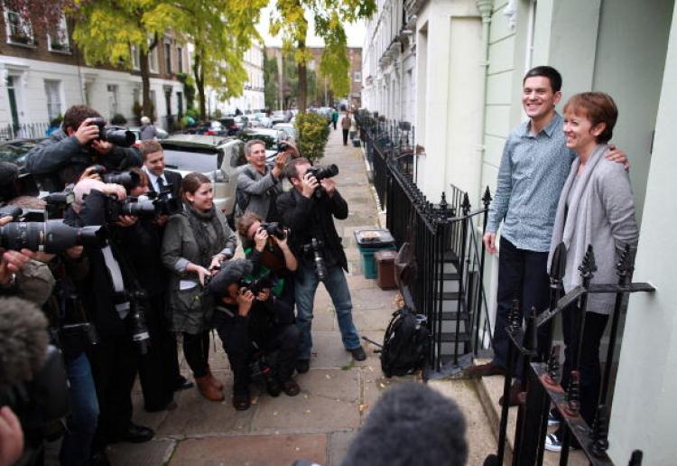 David Miliband, brother of Labour leader, Ed, poses with his wife Louise for photographers on the steps of their London home on September 29, 2010. (Peter Macdiarmid/Getty Images) David Miliband, brother of Labour leader, Ed, poses with his wife Louise for photographers on the steps of their London home on September 29, 2010. (Peter Macdiarmid/Getty Images)