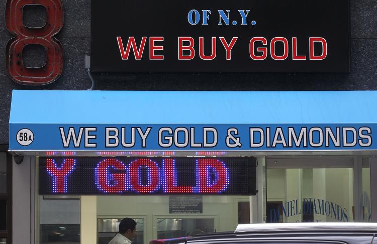 A sign reading 'We Buy Gold & Diamonds' is displayed in the Diamond District September 29, 2010 in New York City. (Mario Tama/Getty Images) A sign reading 'We Buy Gold & Diamonds' is displayed in the Diamond District September 29, 2010 in New York City. (Mario Tama/Getty Images)