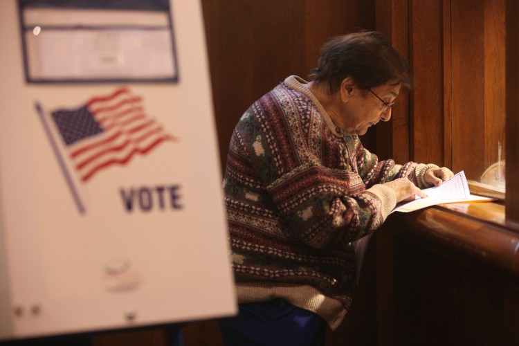 Santina Spadaro checks her ballot before casting her vote at a Manhattan polling place Santina Spadaro checks her ballot before casting her vote at a Manhattan polling place
