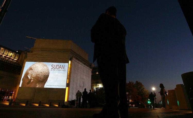 Images from South Sudan are projected onto the exterior of the United States Holocaust Memorial Museum November 8, in Washington, DC. The images are part of a new program at the museum. (Win McNamee/Getty Images) Images from South Sudan are projected onto the exterior of the United States Holocaust Memorial Museum November 8, in Washington, DC. The images are part of a new program at the museum. (Win McNamee/Getty Images)