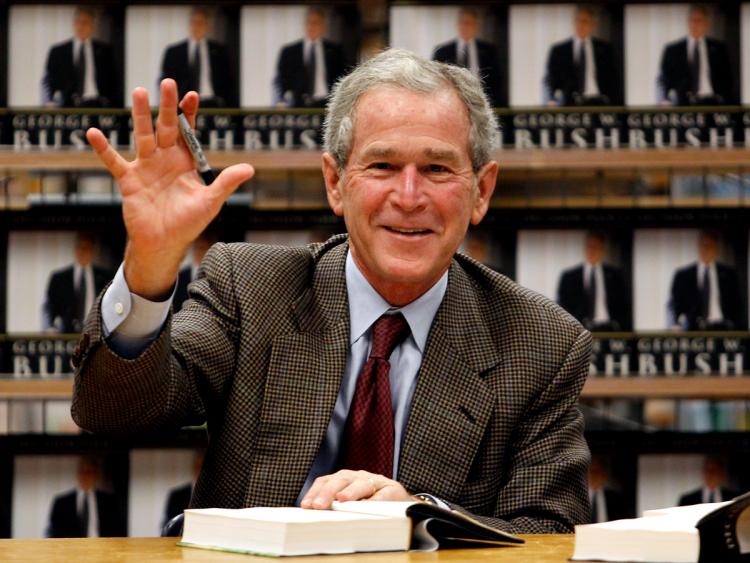 Former U.S. President George W. Bush waves while signing copies of his new memoir 'Decision Points' at Borders Books on November 9, 2010 in Dallas, Texas (Photo by Tom Pennington/Getty Images) Former U.S. President George W. Bush waves while signing copies of his new memoir 'Decision Points' at Borders Books on November 9, 2010 in Dallas, Texas (Photo by Tom Pennington/Getty Images)