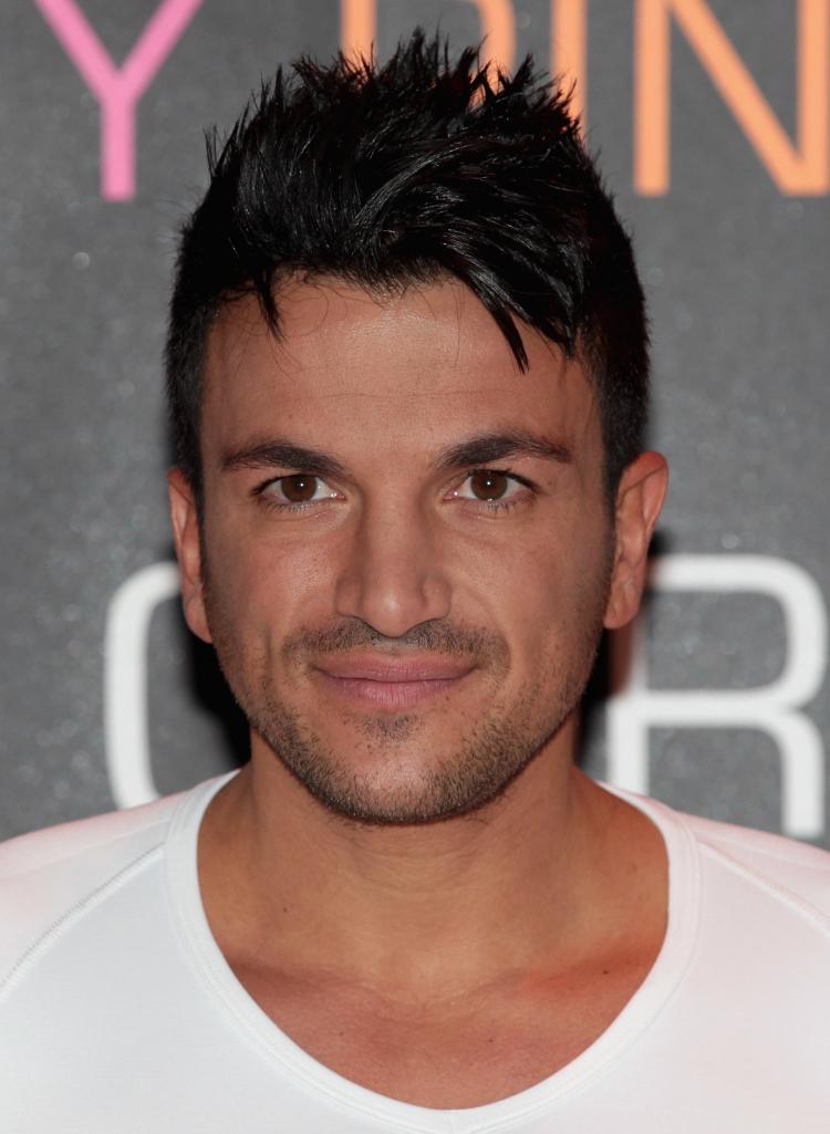Peter Andre poses as he launches the 'Max-Core' posture and muscle defining t-shirt at the Worx Studios on Nov. 16 in London. (Chris Jackson/Getty Images)