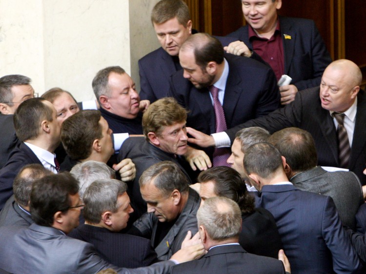 PARLIAMENTARY FISTICUFFS: Opposition and majority deputies clash in Ukraine's Parliament in November 2010, during debates on a tax reform project in Kyiv. Corruption in Parliament is hurting Ukraine's reputation nationally and internationally. (Alexander Prokopenko/AFP/Getty Images) PARLIAMENTARY FISTICUFFS: Opposition and majority deputies clash in Ukraine's Parliament in November 2010, during debates on a tax reform project in Kyiv. Corruption in Parliament is hurting Ukraine's reputation nationally and internationally. (Alexander Prokopenko/AFP/Getty Images)