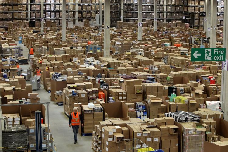 TIS' THE ONLINE SEASON: Staff at the 800,000 sq ft Amazon Swansea fulfillment center process orders prior to 'Cyber Monday' as they prepare for their busiest holiday season on record on Nov. 26 in Swansea, Wales. (Matt Cardy/Getty Images) TIS' THE ONLINE SEASON: Staff at the 800,000 sq ft Amazon Swansea fulfillment center process orders prior to 'Cyber Monday' as they prepare for their busiest holiday season on record on Nov. 26 in Swansea, Wales. (Matt Cardy/Getty Images)