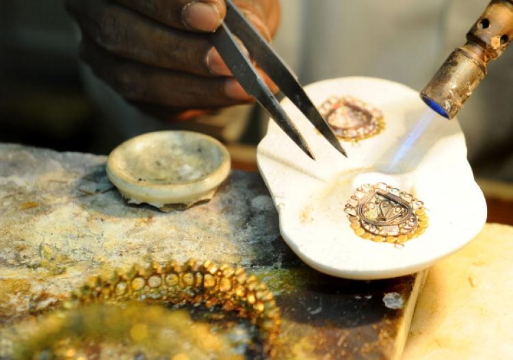 The counterfeiting of gold comes at a time when gold prices are soaring. (Arif Ali/AFP/Getty Images) The counterfeiting of gold comes at a time when gold prices are soaring. (Arif Ali/AFP/Getty Images)