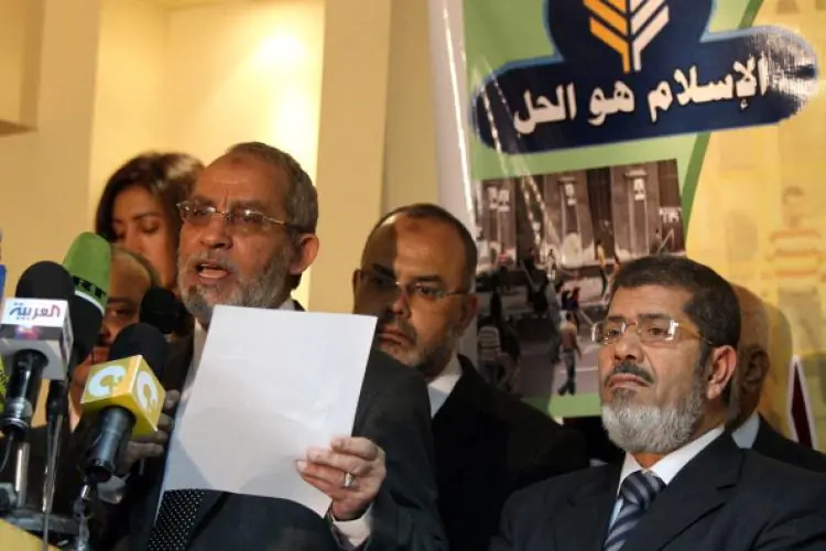 Mohammed Badie (L), the head of Egypt's Muslim Brotherhood, holds a press conference. (file, Khaled Desouki/AFP/Getty Images)