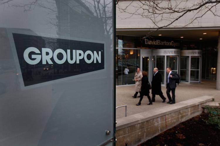 A sign marks the location of the Groupon headquarters in Chicago, Illinois. (Scott Olson/Getty Images) A sign marks the location of the Groupon headquarters in Chicago, Illinois. (Scott Olson/Getty Images)